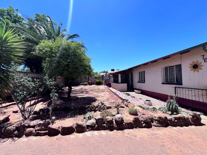 3-Bedroom House To Rent in Uitsig with spacious backyard and carport.