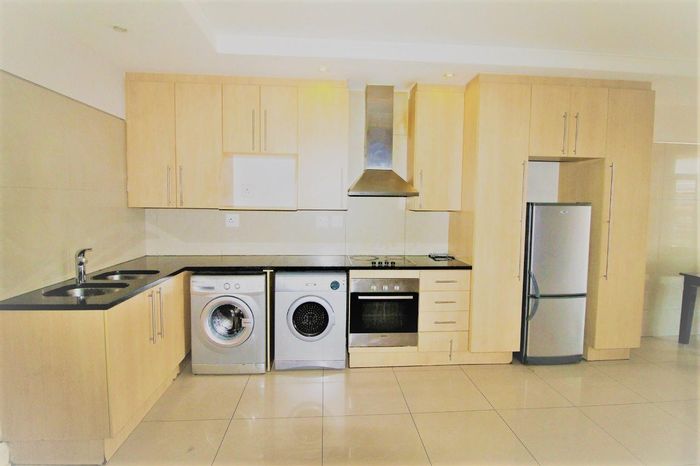 2-Bedroom Apartment To Rent in Sandown with Balcony, Pool, and Secure Access.