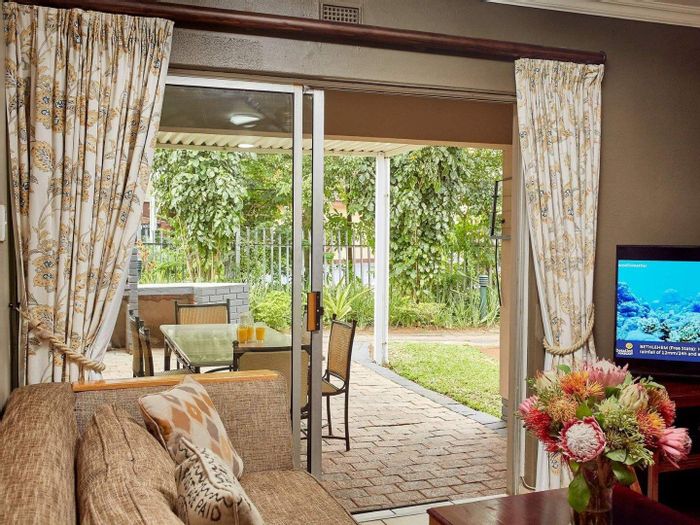 For Sale: Apartment in St Lucia Central with pool, sauna, and private patio.