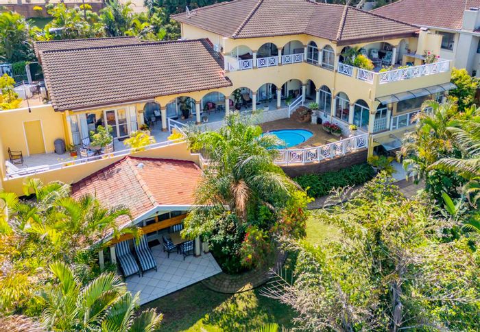 For Sale: 8-bedroom guesthouse in Umhlanga Central with income potential and amenities.