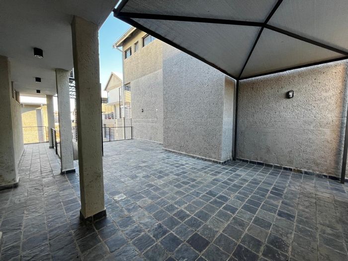 For Sale: Spacious Auasblick Townhouse with 4 bedrooms, double garage, and flat.