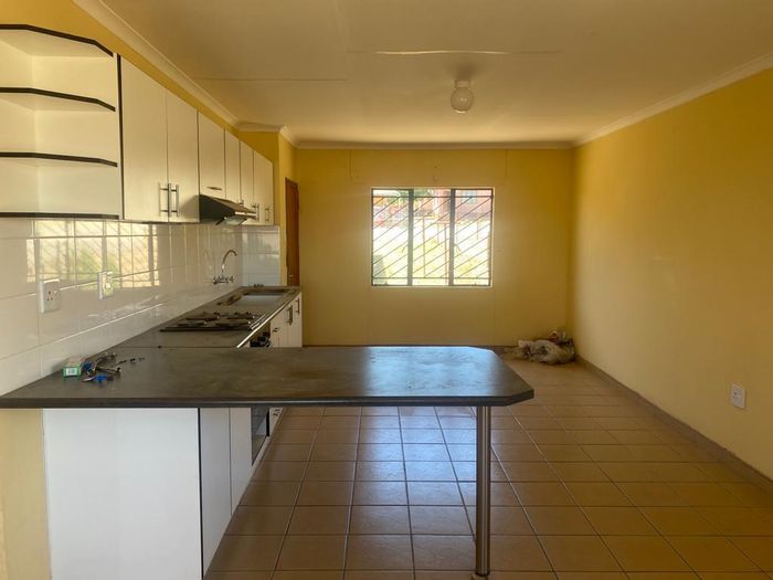 House for Sale in Okahandja Central: Two bedrooms, open-plan living, approved extension plans.