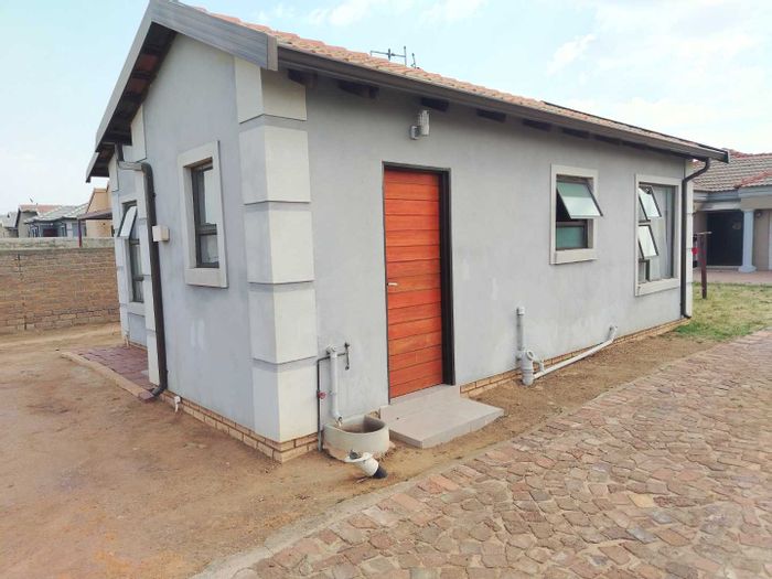 Two-Bedroom House For Sale in Sharon Park with 24-hour security and nearby schools.