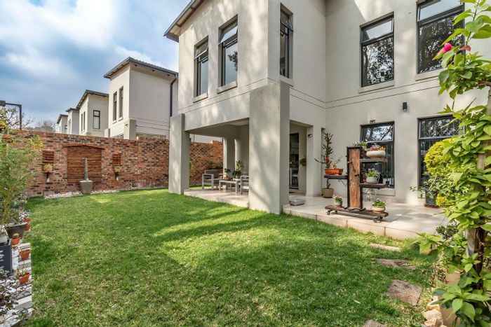 Chic Kyalami Townhouse with Japanese Garden, Double Garage, and Estate Amenities - For Sale