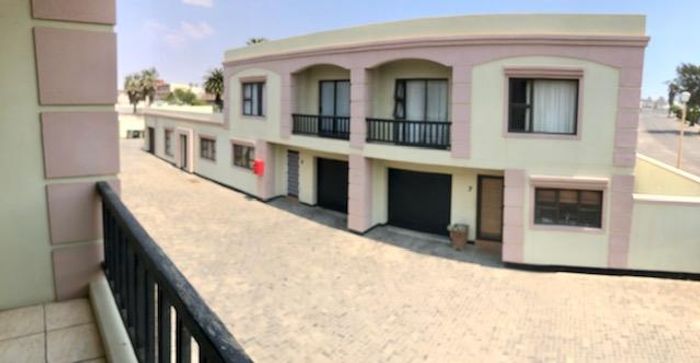 For Sale: 3-Bedroom Apartment Near Lagoon with Enclosed Yard, BBQ, and Garage