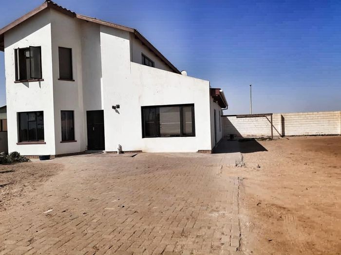 For Sale: Henties Bay Industrial House with workshop, garage, and spacious yard.