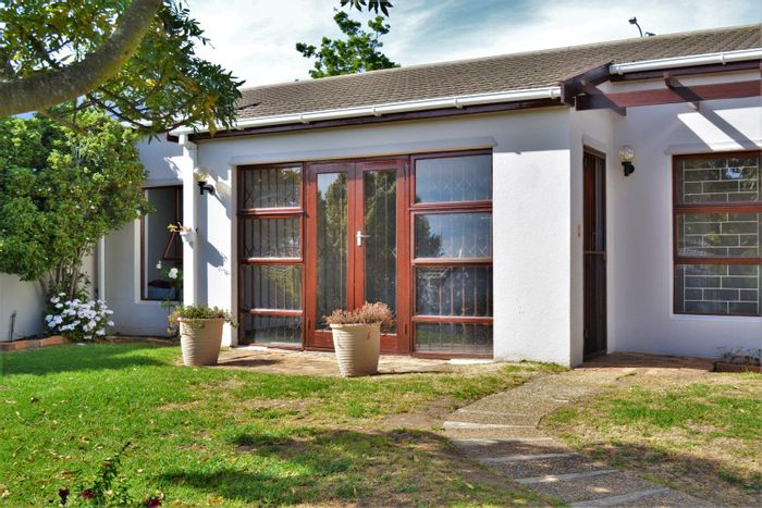 To Rent: Townhouse in Protea Valley with garden, pool access, and courtyard.