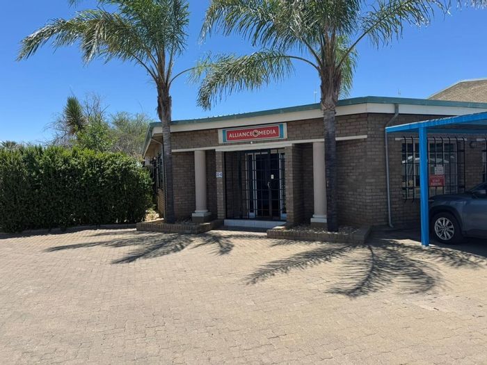 Industrial Warehouse with Offices for Rent in Prosperita, featuring ample parking and utilities.