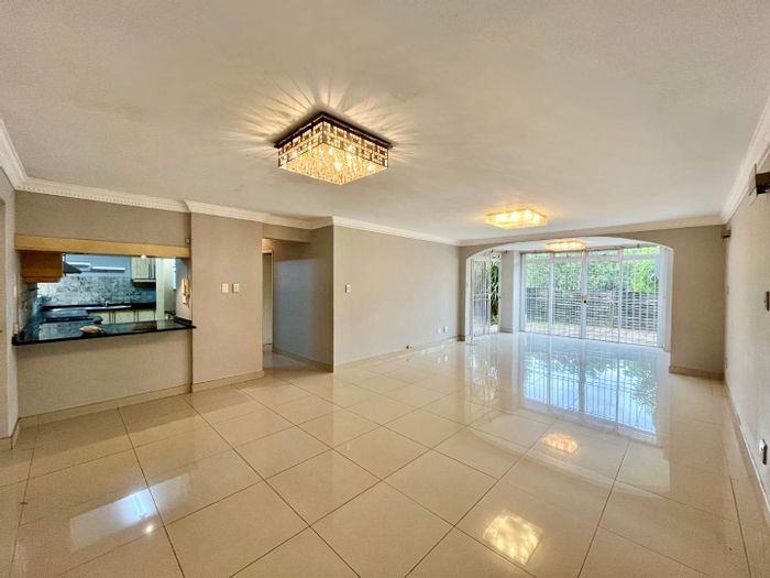 3-Bedroom Townhouse To Rent in Umgeni Park with garden, air conditioning, and WiFi.