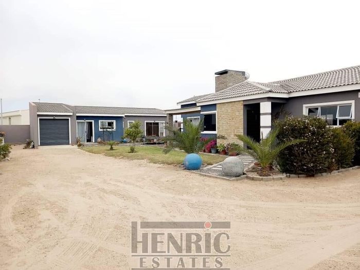 Ocean View House For Sale: Spacious layout, ocean access, and private backyard.