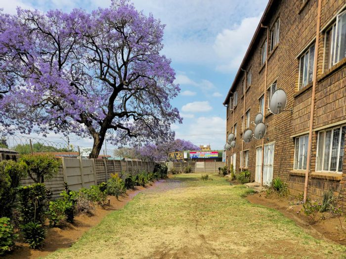 2-Bedroom Apartment For Sale in Pretoria North, secure complex near amenities.