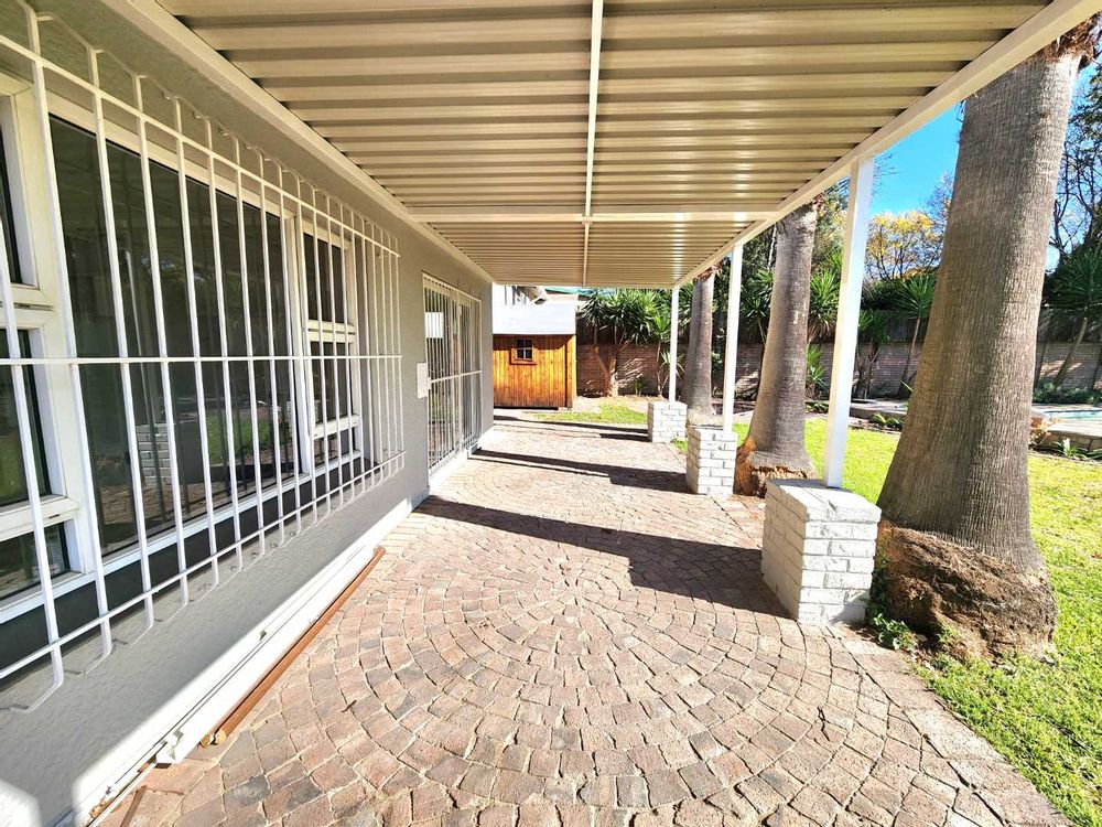 View through patio to shed