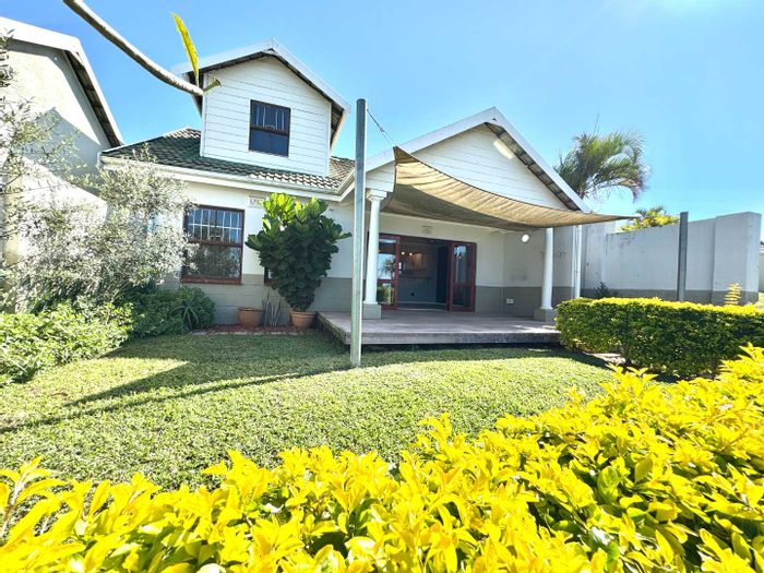 Townhouse to rent in Umhlanga Central with pool, patio, and pet-friendly garden.