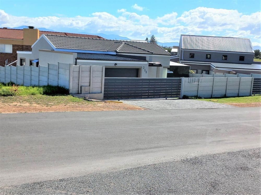 2 Upmarket Houses directly next to us - on the side of Hermanus.