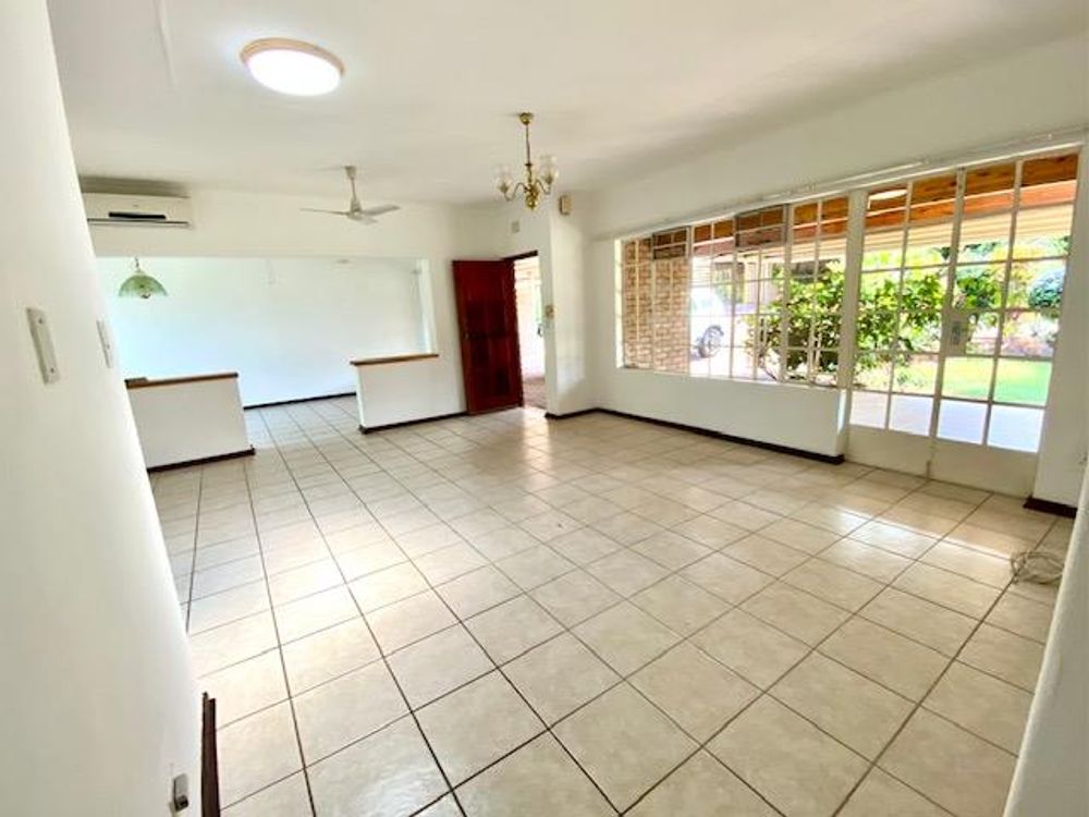 Front door enters into the  lounge with the dining room on the right