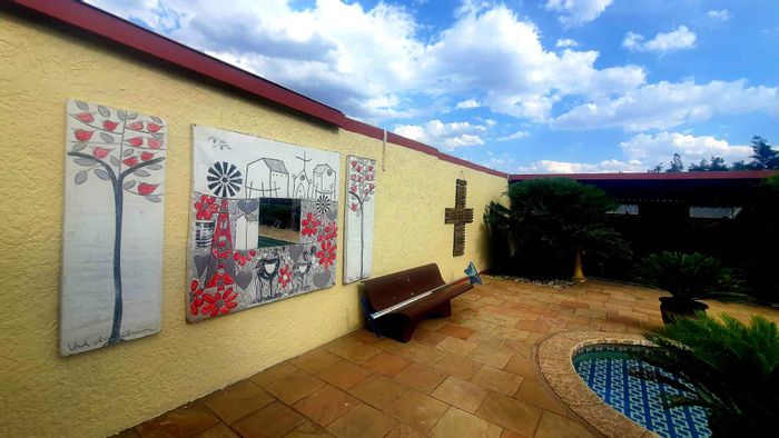 For Sale: Spacious 4-bedroom house in Alberton Central with pool, cottage, and solar system.