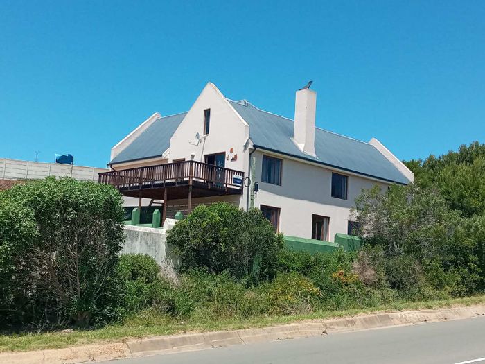 For Sale: Spacious 5-bedroom house in Still Bay West with river views and garage.
