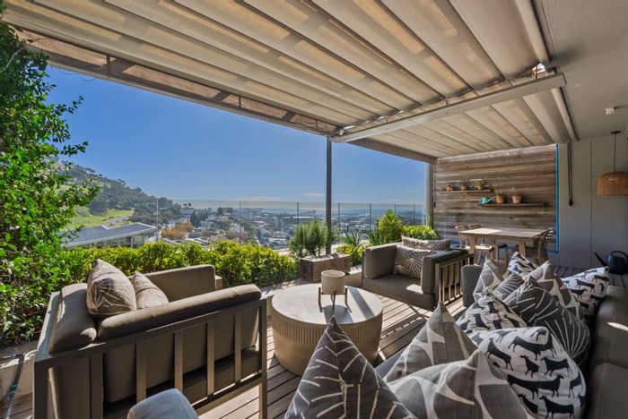 Duplex apartment for sale in De Waterkant with pool, gym, and rooftop bar.