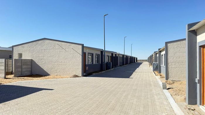 Townhouse For Sale in Walvis Bay Central with gated security and eco-friendly features.
