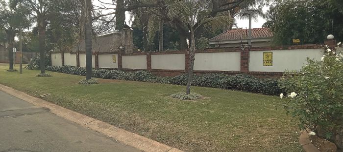 For Sale: Spacious Van Riebeeck Park House with Pool, Flatlet, and Security Features.