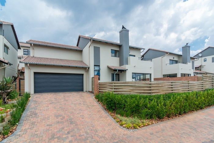 For Sale: Townhouse in Amorosa with garden, gas braai, and 24-hour security.