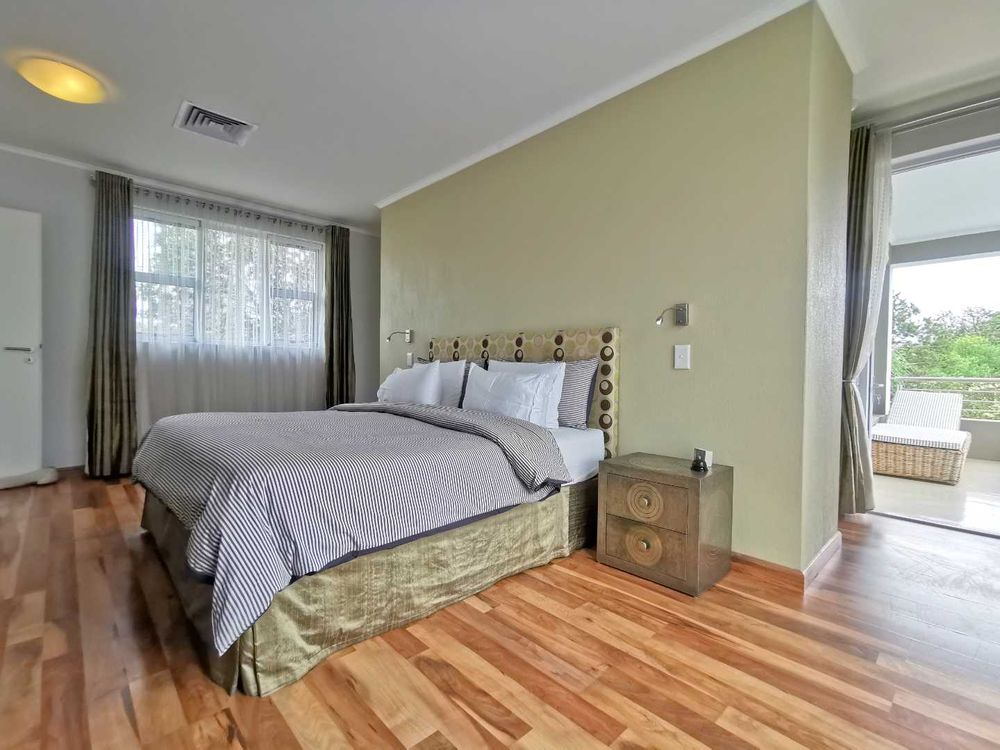 MASTER BEDROOM IN 1ST FLOOR WITH FULL EN-SUITE AND BALCONY 