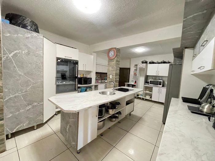 For Sale: Spacious 4-Bedroom House in Hochlandpark with Entertainment Area and Double Garage.