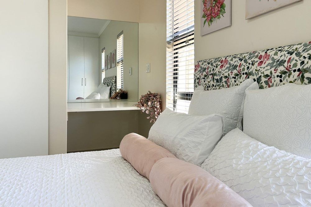 Main bedroom with built-in cupboards & ensuite.