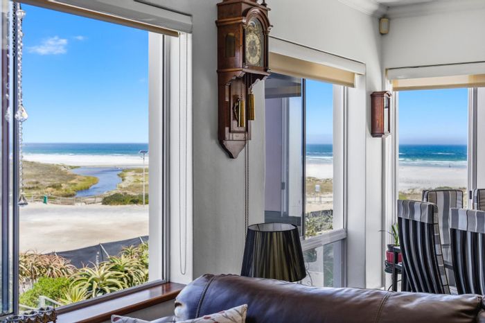 For Sale: 3-Bedroom Apartment in Melkbosstrand Central with Ocean Views and Beach Access.