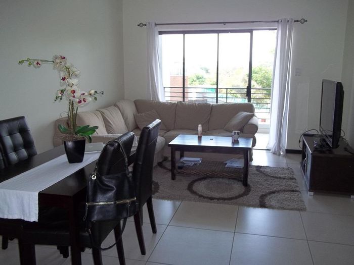 For Sale: Fourways Apartment with balcony, eco-friendly appliances, and lifestyle estate amenities.