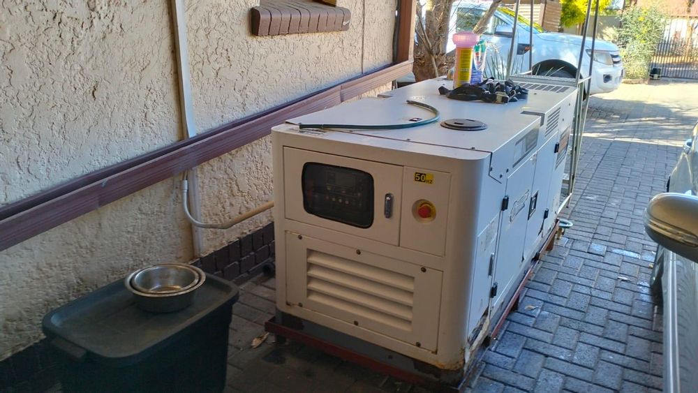 Generator supplying both properties with electricity