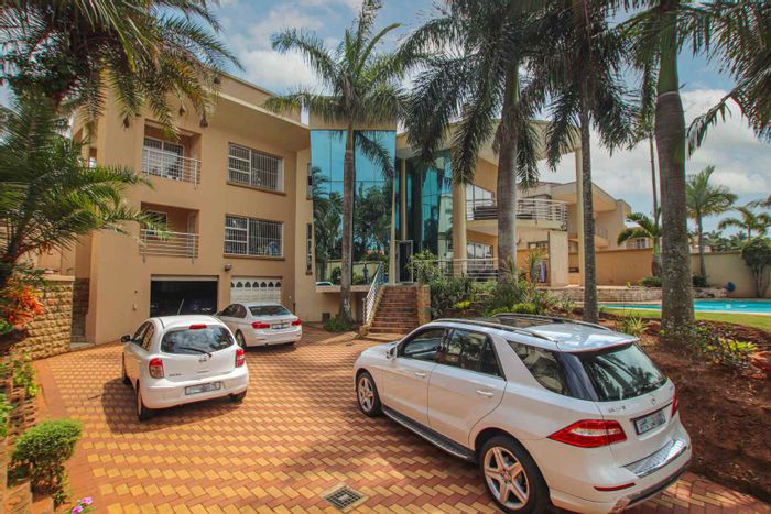 For Sale: Spacious Umhlanga Central house with 5 bedrooms, ample parking, and entertainment areas.