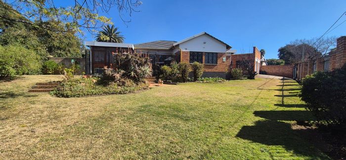 For Sale: Spacious South Crest House with garden, garages, and versatile living spaces.
