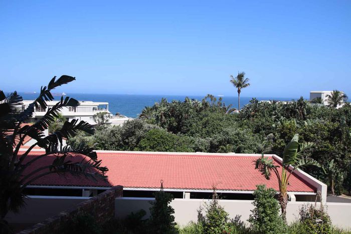 For Sale: Apartment in Umhlanga Central with beach access, pool, and security.