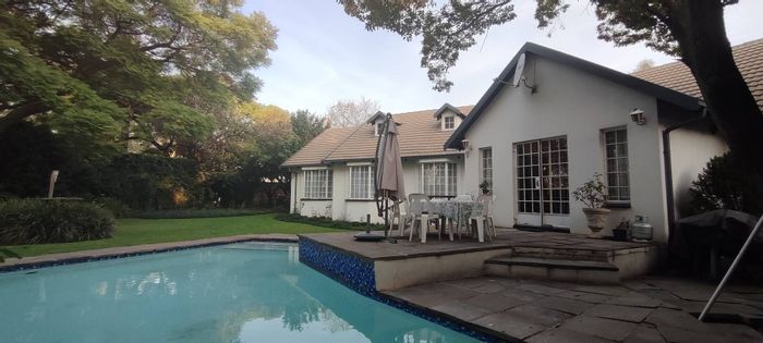 House for Sale in Monument Park: Pool, garden, study, security features, double garage.