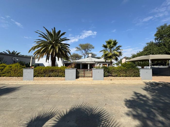 For Sale: House in Okahandja Central with multiple homes, flatlets, and entertainment areas.