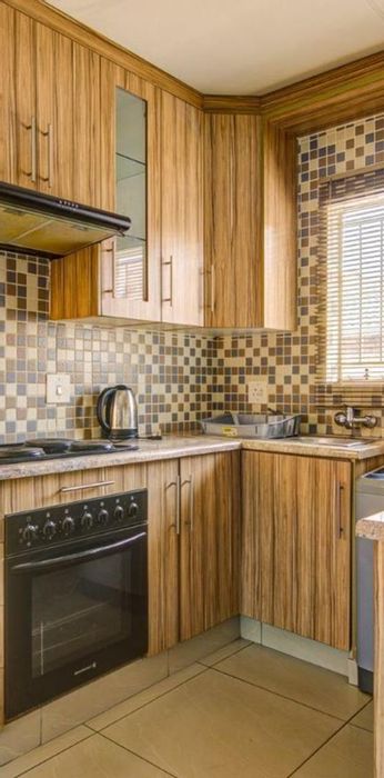 Birchleigh Townhouse For Sale: 2 bedrooms, communal pool, secure garage, garden views.