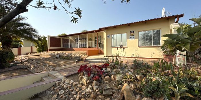 Spacious 4-bedroom house in Windhoek West with ample parking and outdoor potential. For Sale.