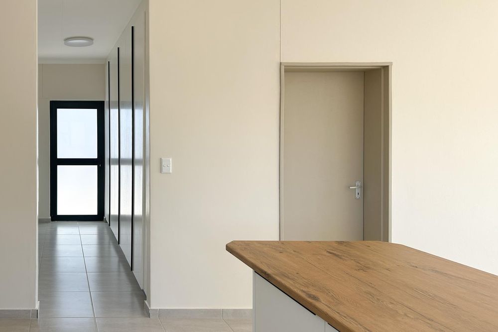 Modern kitchen island with scullery.