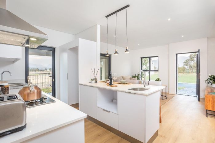 For Sale: House in Paarl North with inverter, green spaces, and community amenities.