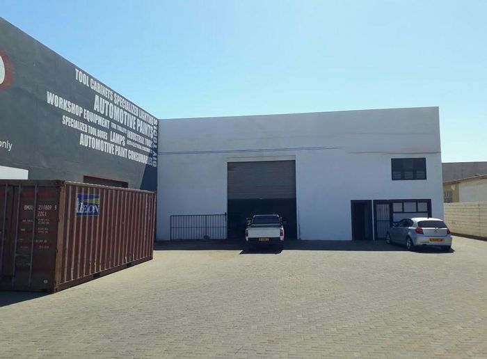 Industrial complex for sale in Walvis Bay Central with three warehouses and secure storage.