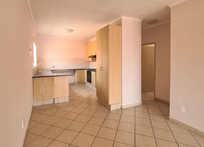 2-Bedroom Apartment in Hazeldean with Garage, Patio, and Load-Shedding-Free Living.