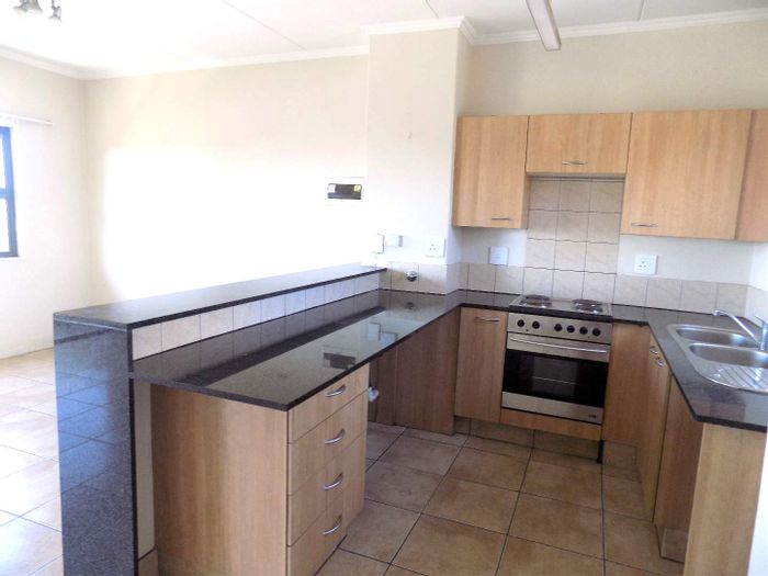 Duplex apartment for sale in Sunninghill with pool, security, and parking.