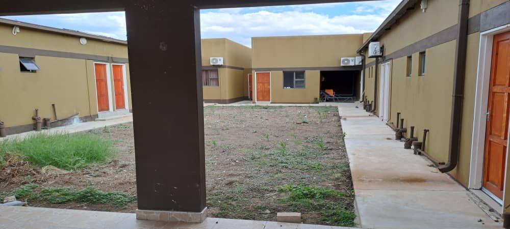 The backside of the rooms and the view of the laundry room.