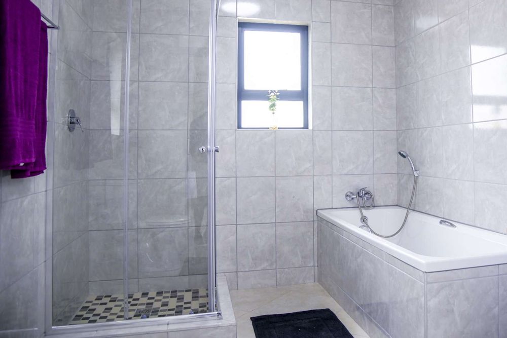 Family bathroom with shower & bath.