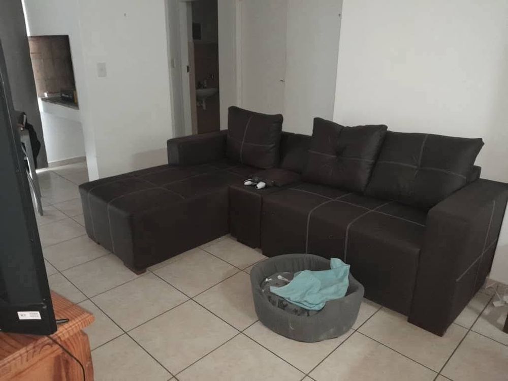 Open plan kitchen - tv area with indoor braai