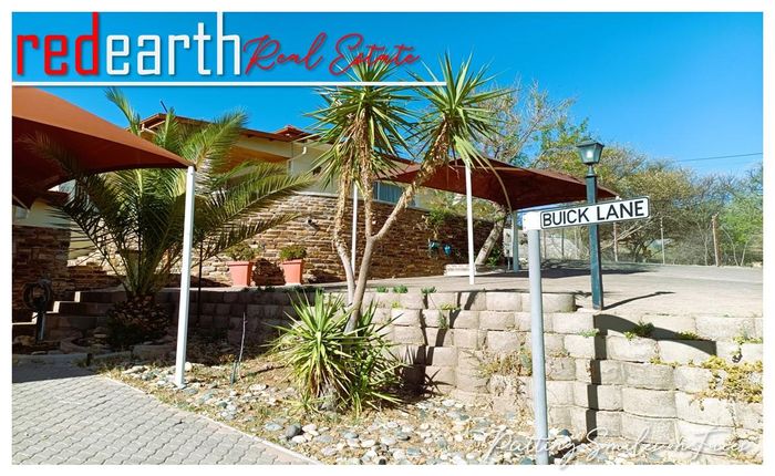 Klein Windhoek House For Sale: Spacious layout, pool, garden, and secure parking.