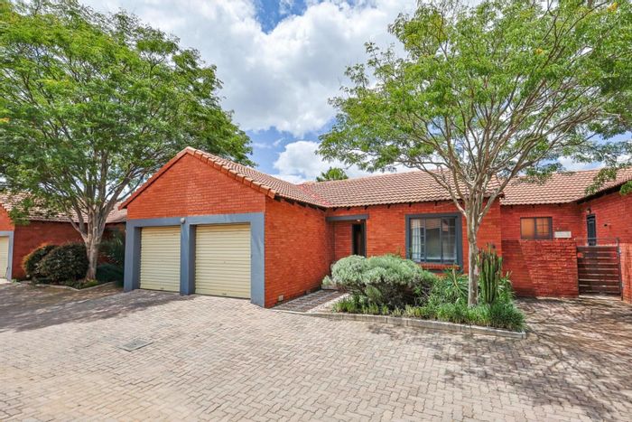 For Sale: Equestria Townhouse with 3 Bedrooms, Patio, and Double Garage.