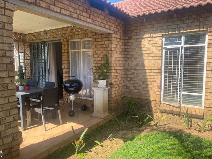 For Sale: 2-Bedroom Townhouse in Moreleta Park with garden, double garage, and security.