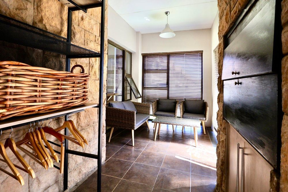 Enclosed patio with built-in braai